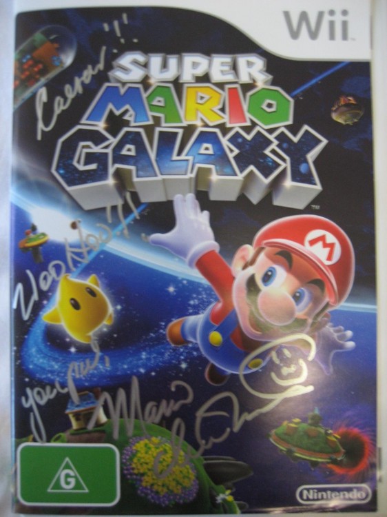 "Caesar! Woohoo! Your pal, Mario Charles Martinet :-E)" My autographed copy of Super Mario Galaxy