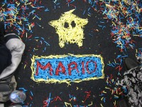 Mario and a super star drawn using confetti